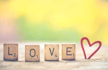 scrabble tiles formed into love